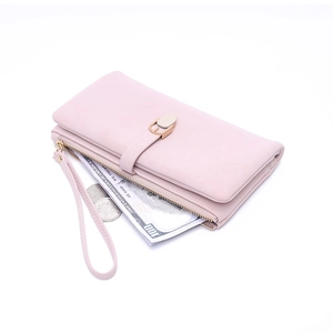 Pale pink long PU leather wallet with gold zipper and wrist strap on white background