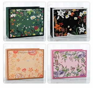 Detail view of four floral gift bags in M and L sizes with elegant vintage patterns