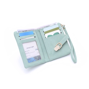 Minimalist mint green small PU leather wallet with multiple card slots and wristlet strap