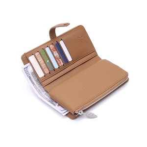 Detail of tan long wallet featuring lychee texture, card slots, and leaf-shaped zipper pull