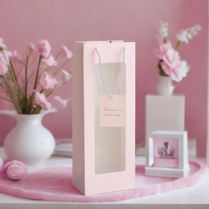 Pink wine gift bag with clear window and greeting card for wedding packaging
