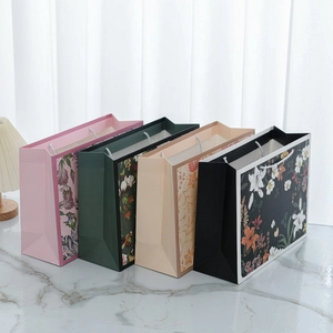 Floral vintage cardboard gift bags set with elegant flower prints and white rope handles