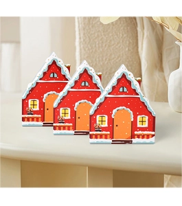 Detailed view of red Christmas house gift boxes with white snow roof and festive decor
