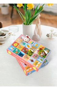 Detail of Easter 24-grid surprise box with small plush toys and colorful cartoon patterns
