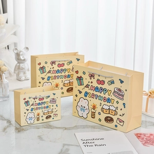 Three sizes of yellow cartoon rabbit birthday gift bags with Happy Birthday prints