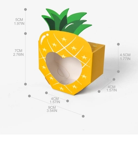 Detailed view of yellow pineapple candy box with dimensions and heart window