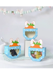 Detail of blue bunny Easter gift box with clear window and carrot ear decorations