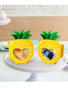 Pineapple shaped party favor boxes with heart window on elegant white pedestal