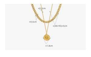 Detail view of gold layered coin necklace with 0.6cm curb chain and 1.8cm pendant sizes