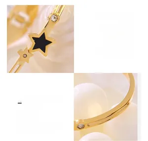 Macro details of titanium steel star bracelet featuring 18K gold plating and tiny zircons