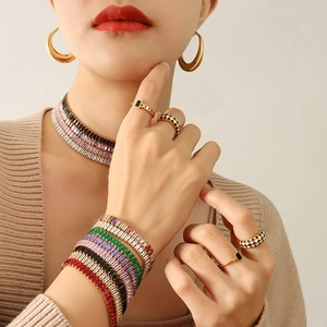 Exaggerated 18k gold plated titanium jewelry set with colorful zircon stones on model