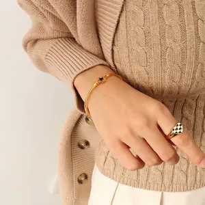 Gold star bangle and checkerboard heart ring set for women in minimalist style