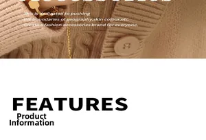 Detail of gold chain bracelet with square pendant worn over a brown knit sweater