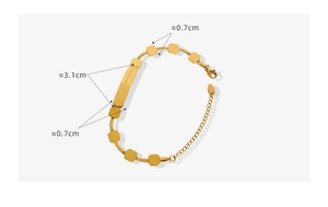 Detail of 18K gold plated titanium bracelet with engraved rectangular plaque and dimensions