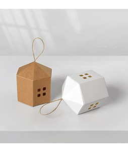 Detailed view of hollowed window design on house-shaped gift boxes with hemp rope handles