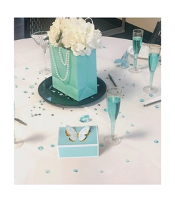 Detail of light blue 3D butterfly gift box and matching gift bag with decorative flowers