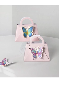 Detail of pink handbag-style wedding gift box with 3D butterfly decor and sturdy handle