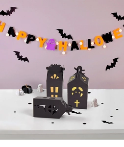 Detailed hollow-out black Halloween gift boxes with ghost and gothic window patterns