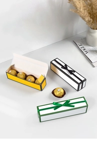 Detailed top view of rectangular ribbon gift boxes for chocolate and jewelry packaging