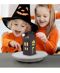 Detailed laser-cut black haunted house candy box with bat patterns for Halloween gifts