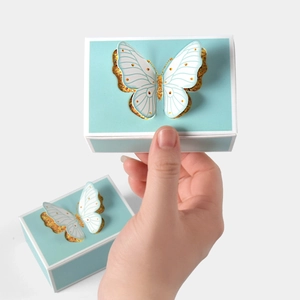 Tiffany blue 3D butterfly wedding favor boxes with elegant gold glitter accents