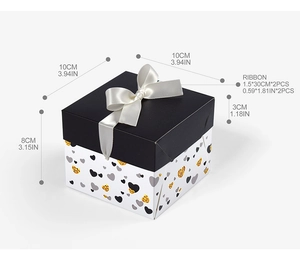 Detail view of 10x10x8cm square gift box with dimensions and black satin bow