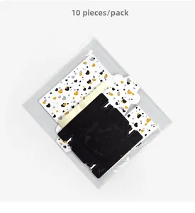 Flat view of 10-piece DIY black and white gift boxes with gold heart glitter patterns