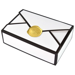 Minimalist envelope style wedding candy box in white with black trim and gold seal