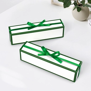 Elegant long rectangular gift box with green bow tie for luxury jewelry or chocolates