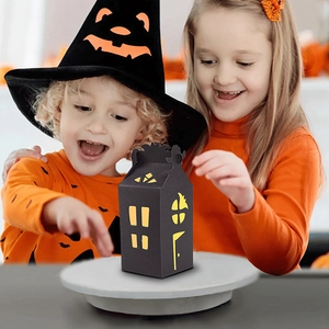 Halloween house shaped candy gift box in black with hollow windows and bat detail