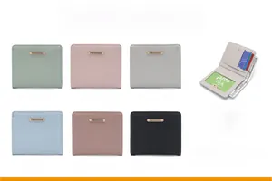 Detailed view of women's short quilted wallet with multiple card slots and metal logo
