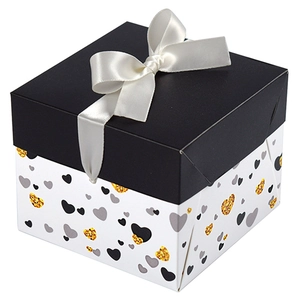 Elegant black and white square gift box with gold glitter hearts and white satin bow