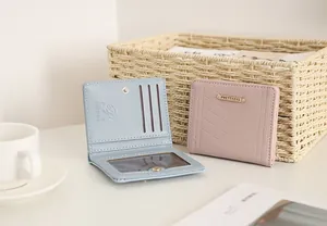 Short women wallet featuring multiple card slots, photo holder and V-shaped stitching