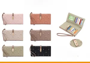 Detailed view of floral long wallet interiors showing card slots and zipper compartments
