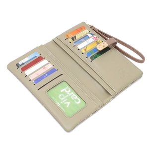 Detail view of large capacity long wallet interior with multi card slots and hand strap