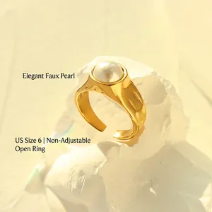Retro 18K gold plated titanium ring featuring a glossy faux pearl on white stone