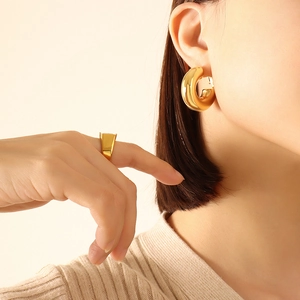 Minimalist U-shaped gold plated chunky earrings and thick band ring for elegant women
