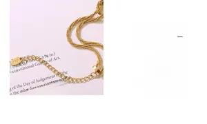 Detail of 18K gold plated knotted chain bracelet with lobster clasp and extension link
