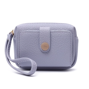 Close-up of lavender PU leather coin purse with lychee texture and gold snap button
