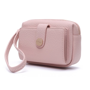 Pink PU leather wristlet wallet featuring a textured finish and secure zipper closure