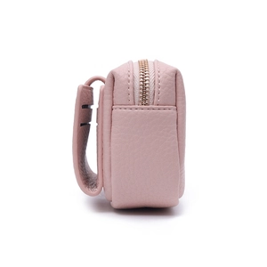 Detail of pink lychee grain PU leather coin purse with zipper and back loop structure