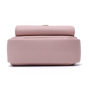 Detailed view of pink pebbled leather coin purse base showing fine stitching quality