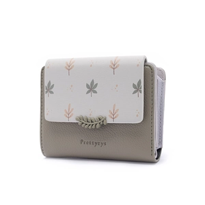Detailed side view of the bifold leaf print wallet featuring a zip coin pocket and lychee texture