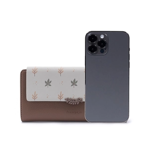 Detailed comparison of floral long PU wallet size with a smartphone on white background
