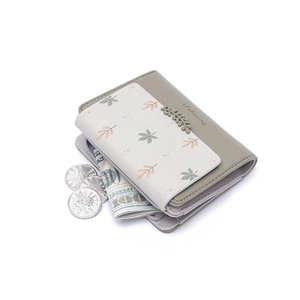 Short PU leather folding wallet with green leaf print and matching leaf charm