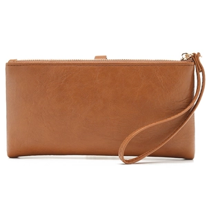 Minimalist caramel brown leather long wallet for women with wristlet strap and zipper closure