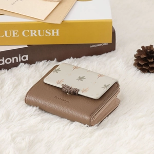 Short PU leather wallet on faux fur with autumn leaf decor and snap closure detail