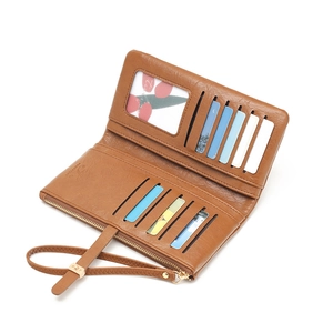 Caramel brown leather long wallet with multi-card slots and secure gold zipper closure