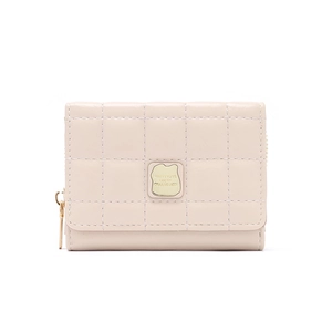 Close-up of pink quilted faux leather wallet with gold logo plaque and zipper detail