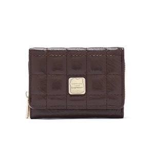 Detailed view of brown quilted PU leather wallet with gold metal logo plaque